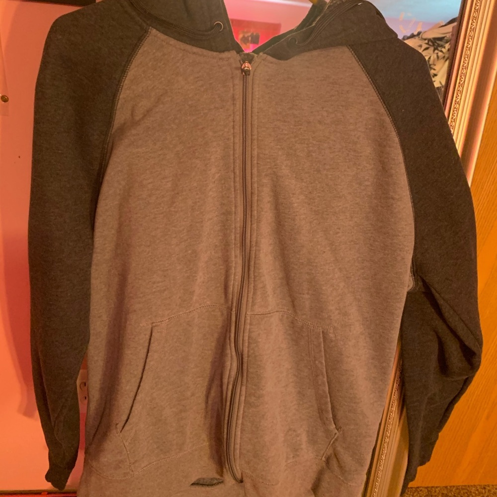 Zip up jacket.